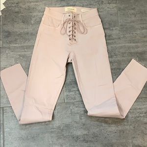 Blush pink tie up jeans from PACSUN